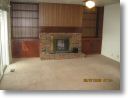 Family room with wood burning fireplace.JPG